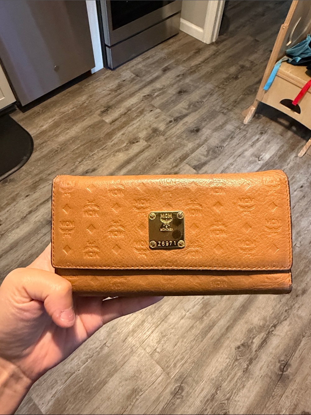 MCM Tan Embossed Leather Continental Wallet with Gold Plaque